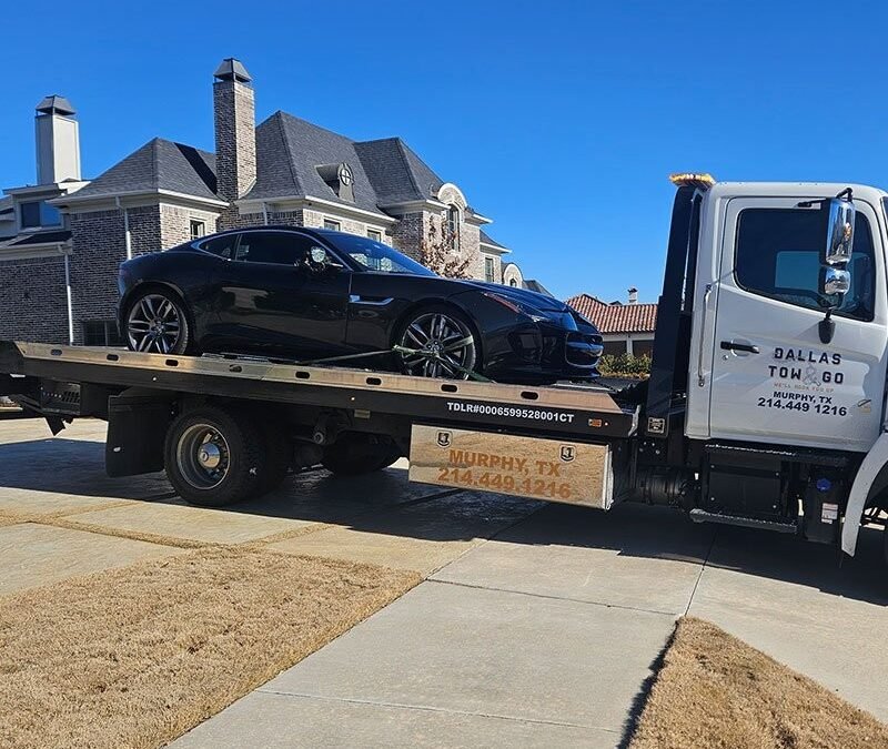 What Makes Flatbed Towing Service Useful for Vehicles With Steering or Wheel Damage?
